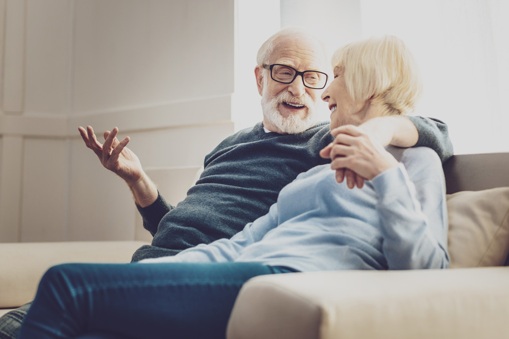 elderly couple discussing estate planning.